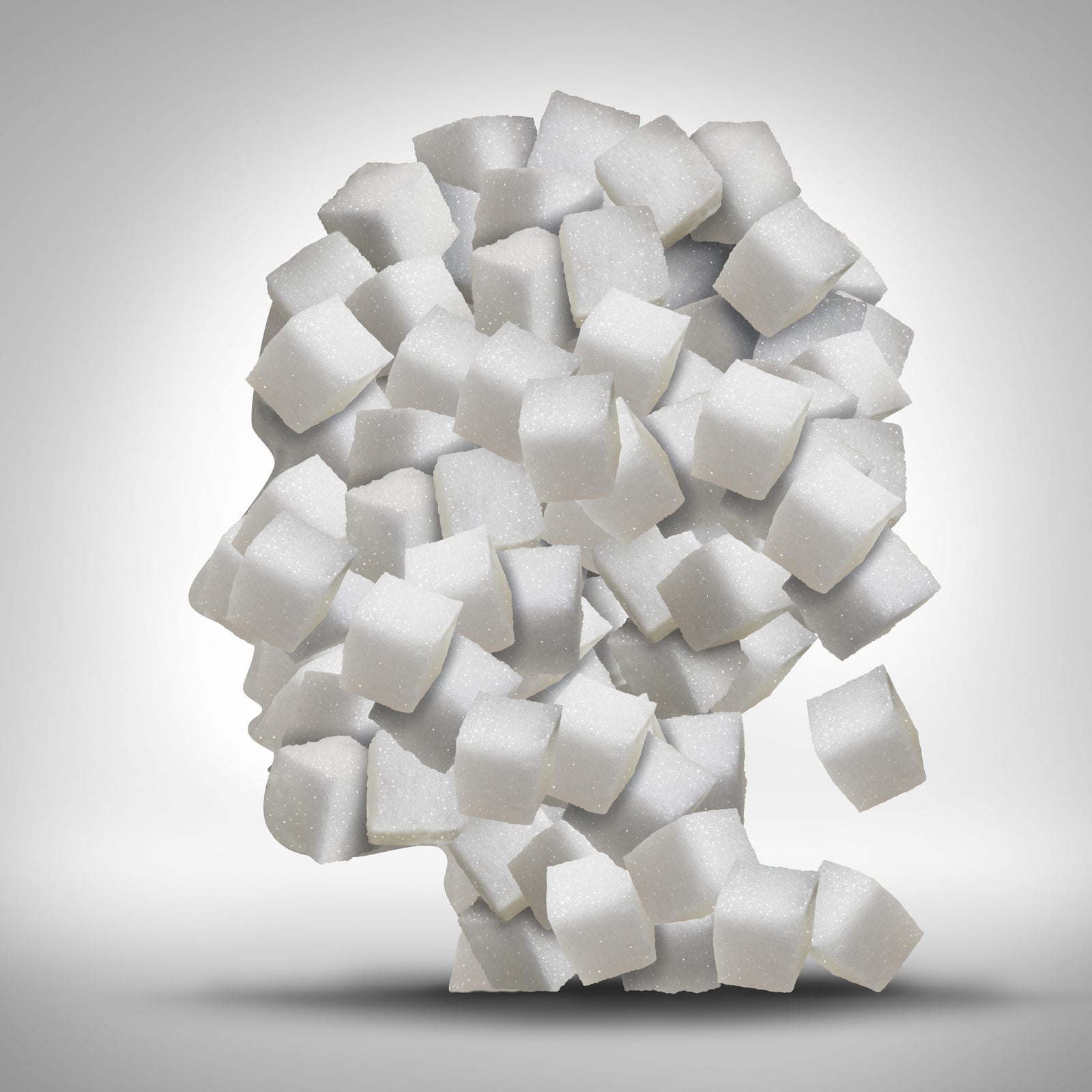 Sugar addiction concept as a human head made of white granulated refined sweet cubes as a health care symbol for being addicted to sweeteners and the medical issues pertaining to processed food to illustrate Pre-Diabetes And Major Cardiovascular Event