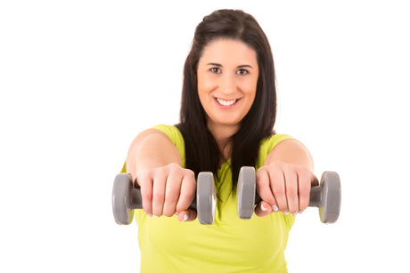 woman weight lifting after gastric sleeve surgery with weights