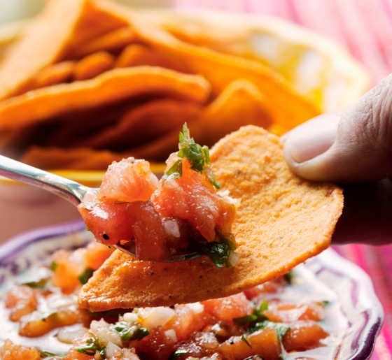 a chip with salsa to illustrate food aversion after gastric bypass