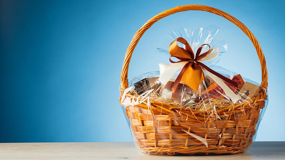 A gift basket on a blue background to illustrate Quick Start Bundles